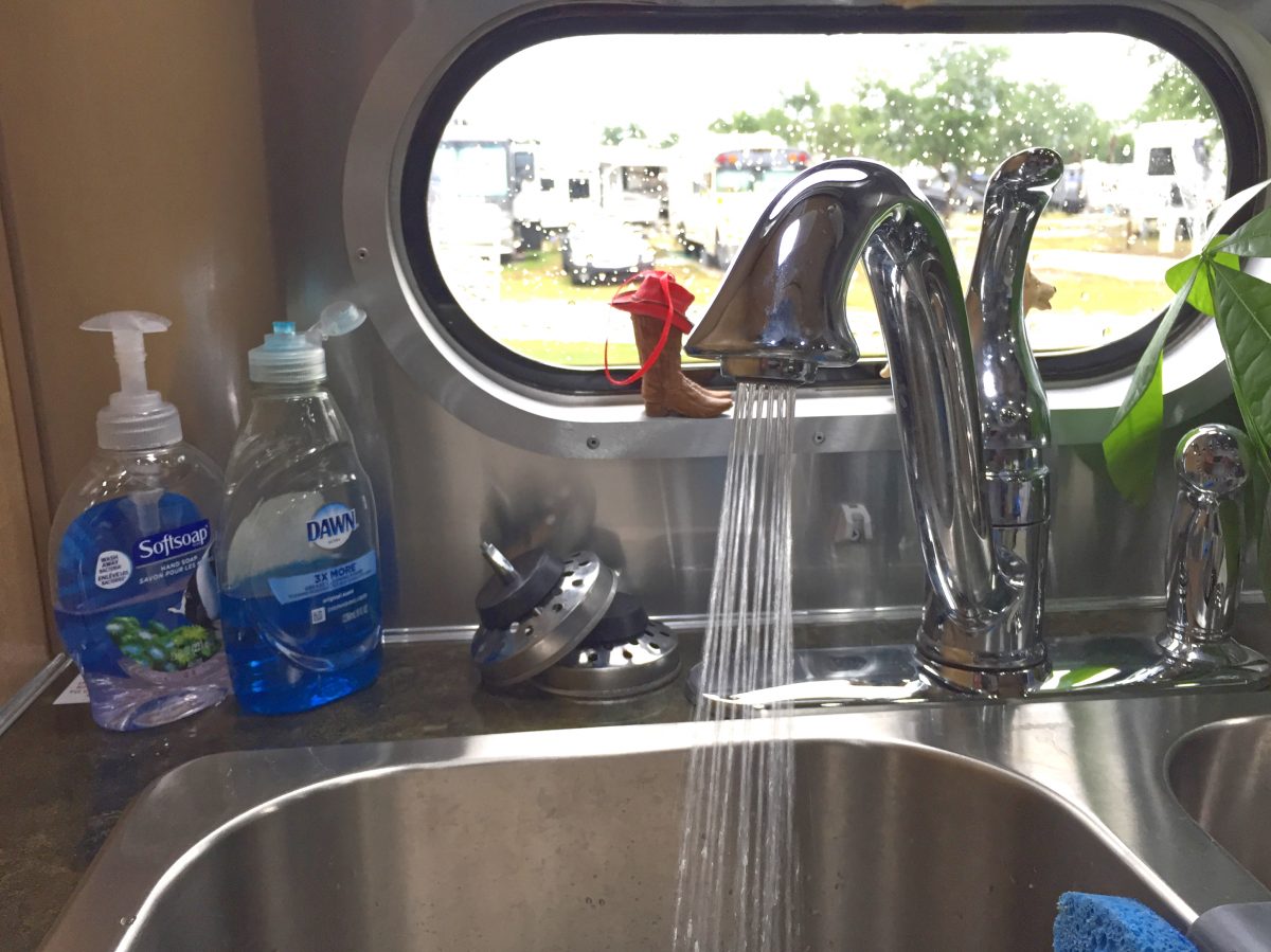 Water conserving faucet aerator used while boondocking