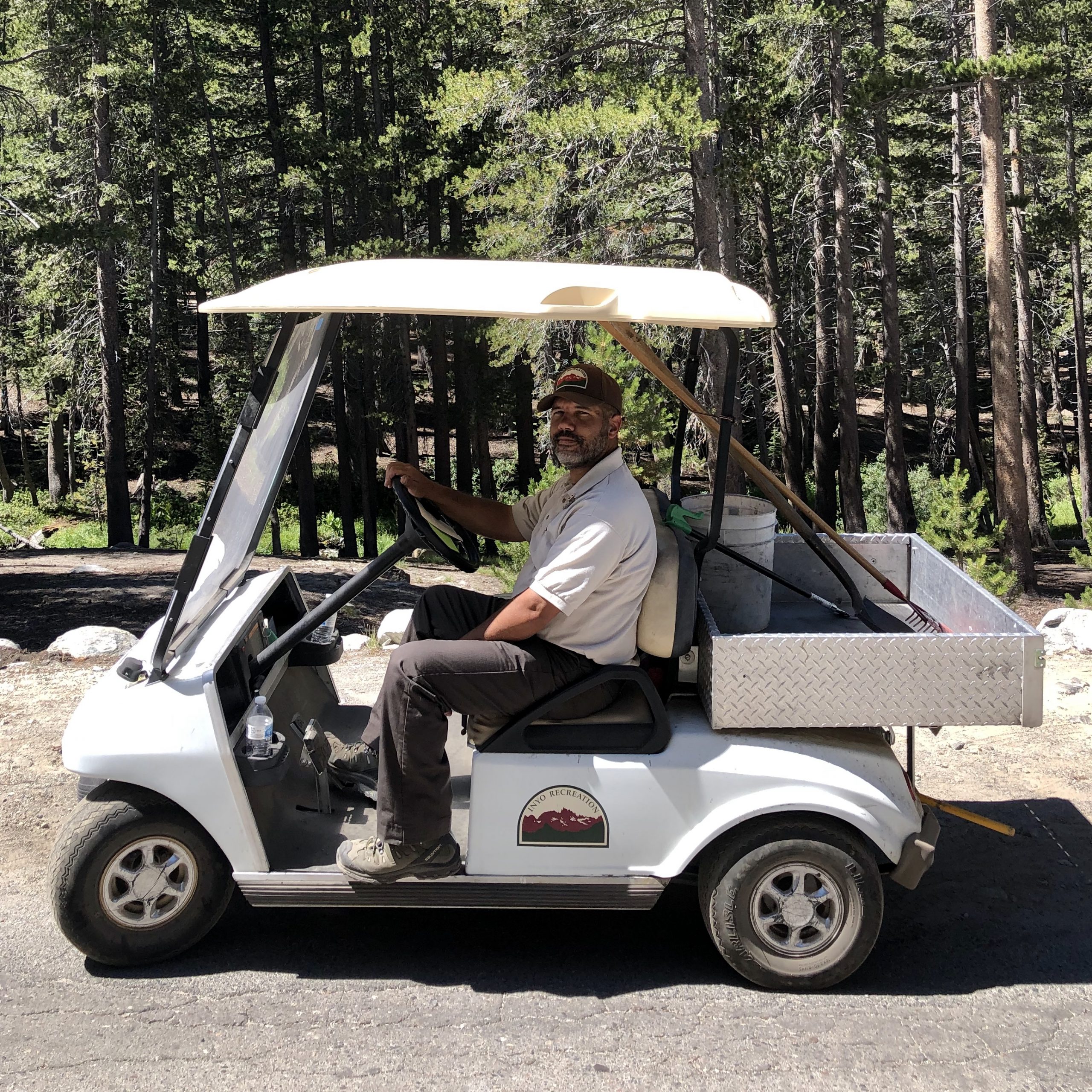 person in golf cart